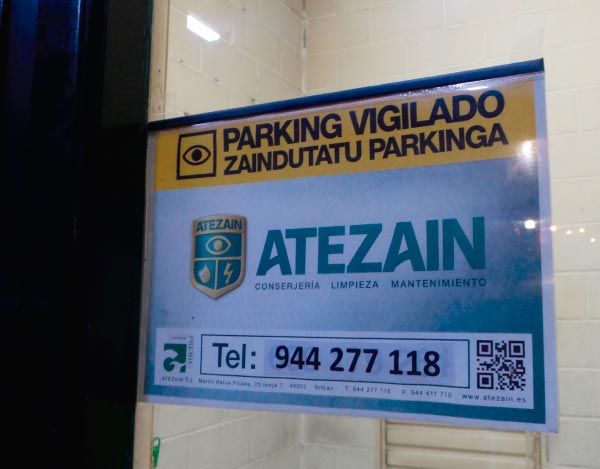 Atezain, Conserjería Limpieza Mantenimiento cartel en parking
